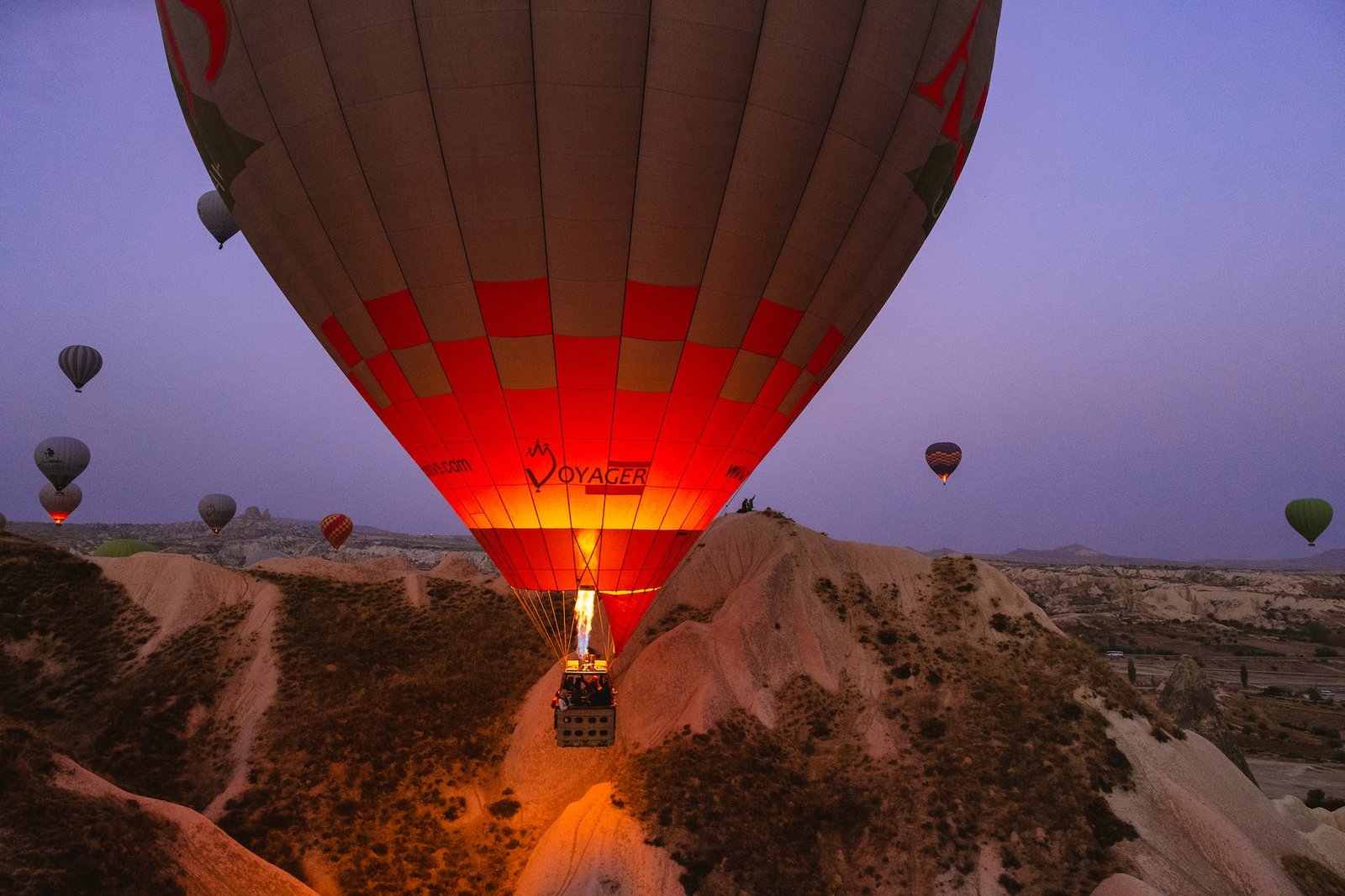 hot air balloon under grey sky