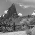 a black and white photo of an old wagon