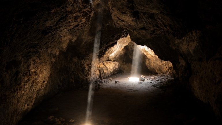 photo of light towards inside of cave