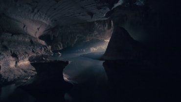 cave interior with body of water