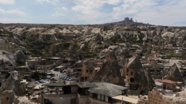 a view of a mountain town in the desert