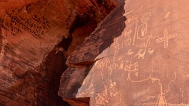 a rock with some drawings on it