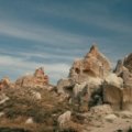 a group of rocks sitting on top of a hill