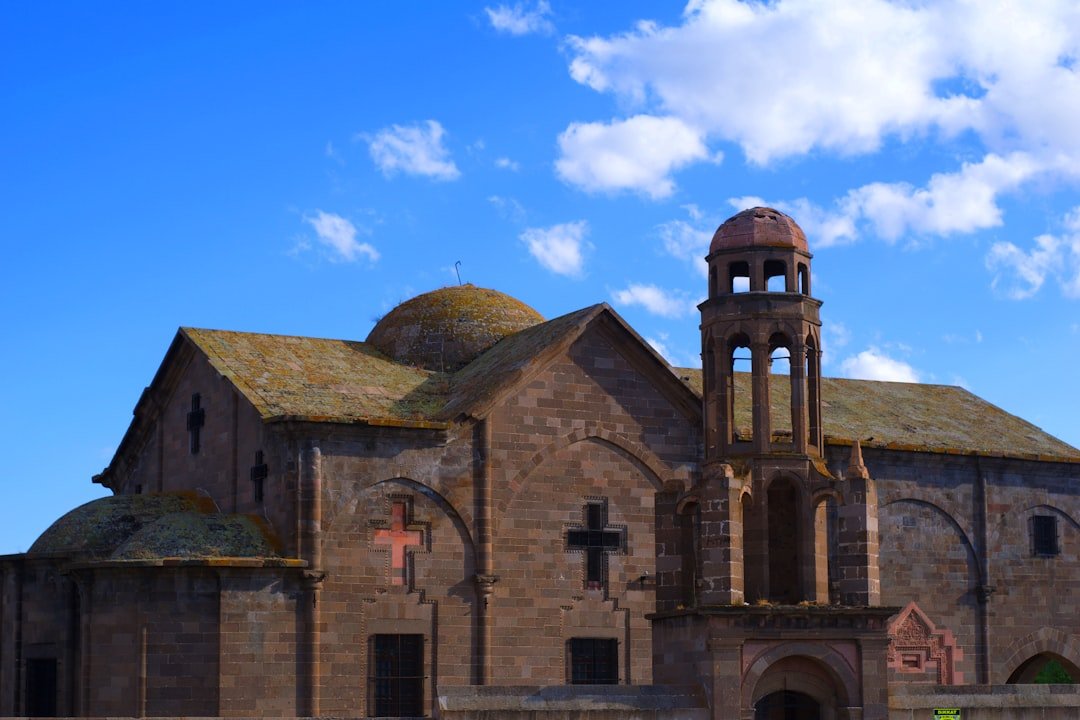 an old church with a clock tower on top of it