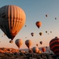 hot air balloons on brown field during daytime