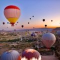 a group of hot air balloons in the sky