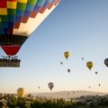 hot air balloons flying during daytime