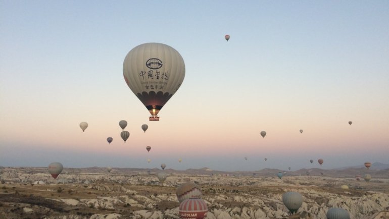 hot air balloon lot on mid air at daytime