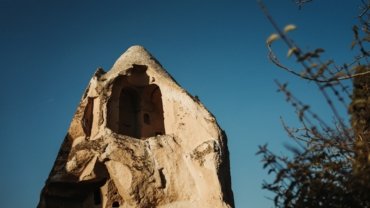 a stone building with a tower